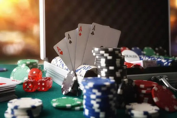 Multi camera live dealer studio with card table and roulette monitor
